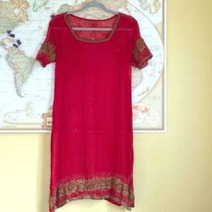 Beautiful red beaded sheer dress.